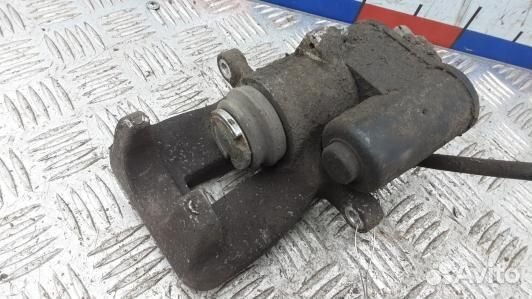 Суппорт тормозной задний правый volkswagen passat