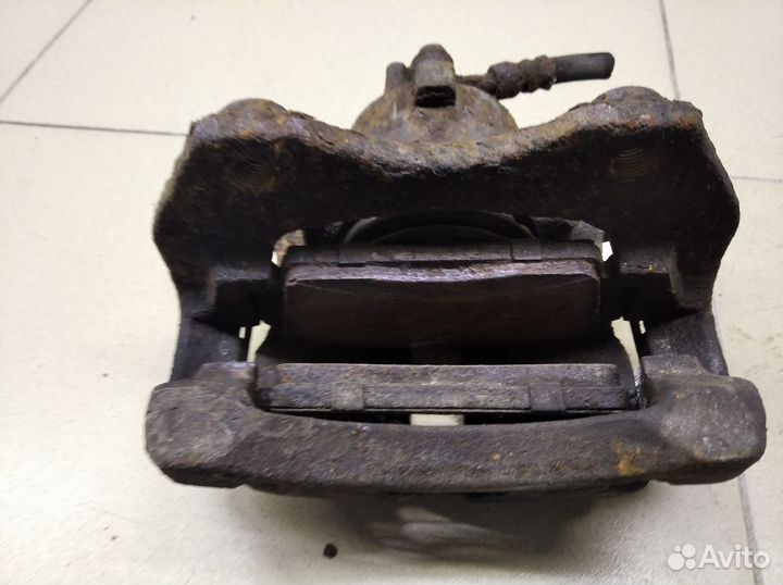 Суппорт передний правый Primera P11E 1996-2002