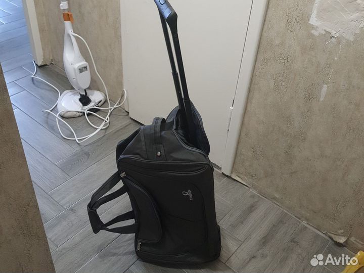 Сумка дорожная на колесах с выдвижной ручкой