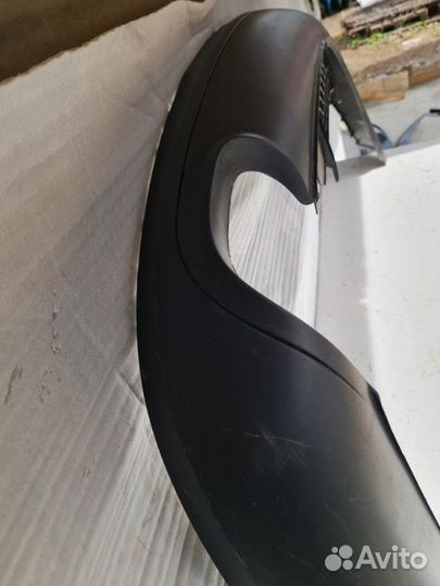 Спойлер (юбка) бампера задний Volkswagen Passat B6