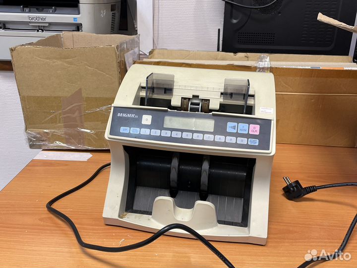 Машинка для подсчета банкнот