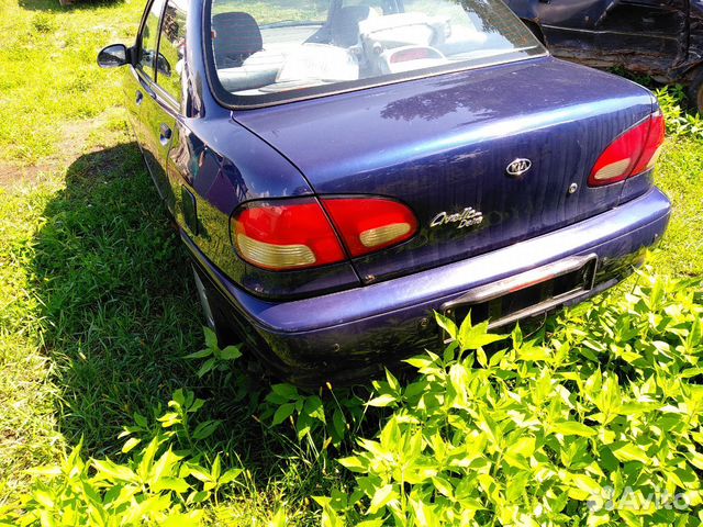 Киа Авелла крышка багажника