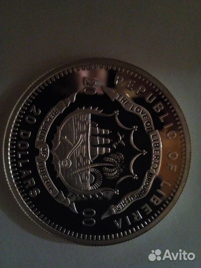 Монета 20 долларов либерия 2000г