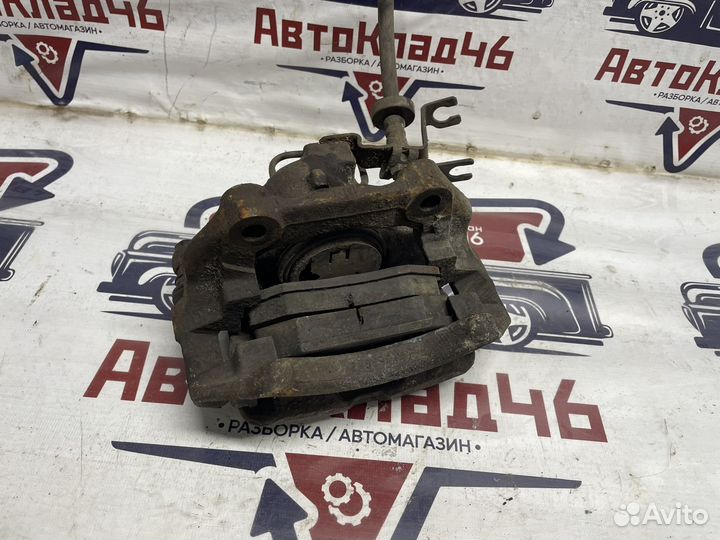 Суппорт тормозной пер левый Ауди А4 Б5 / VW Passat