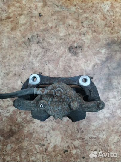 Суппорт тормозной передний правый Opel Astra J