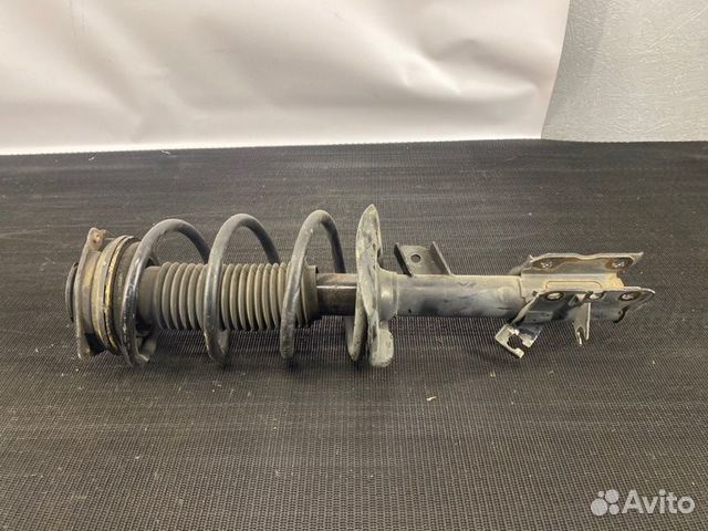 Амортизатор Nissan X-Trail T31 передний правый лев