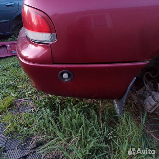 Бампер задний Mazda 626 GE