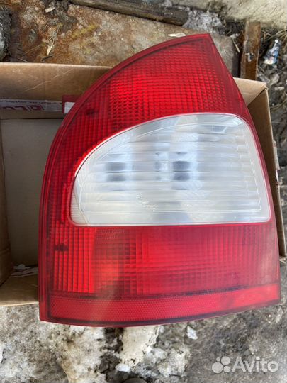Задний левый фонарь Калина седан