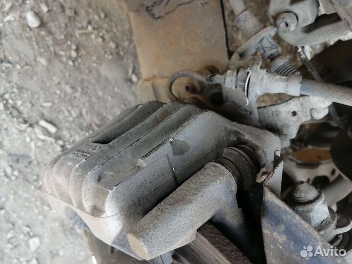 Суппорт задний левый Skoda Octavia A5 2008-2013