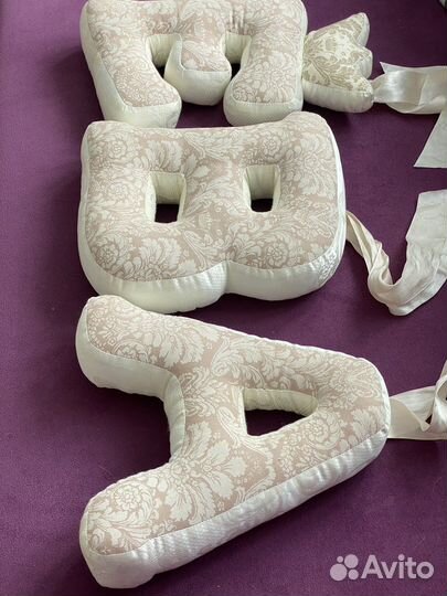 Именные подушки-буквы Ева из ткани на кроватку