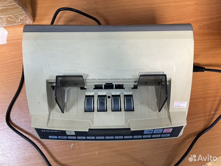 Машинка для подсчета банкнот