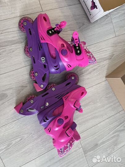 Роликовые коньки