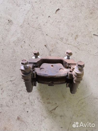 Скоба суппорта заднего Geely Emgrand EC7