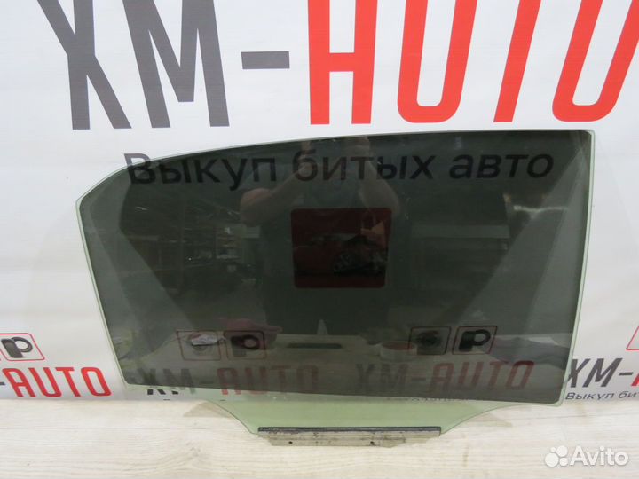 Стекло двери заднее правое Toyota Corolla 150