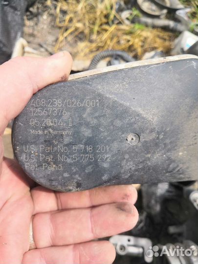 Дроссельная заслонка Cadillac STS 12567376