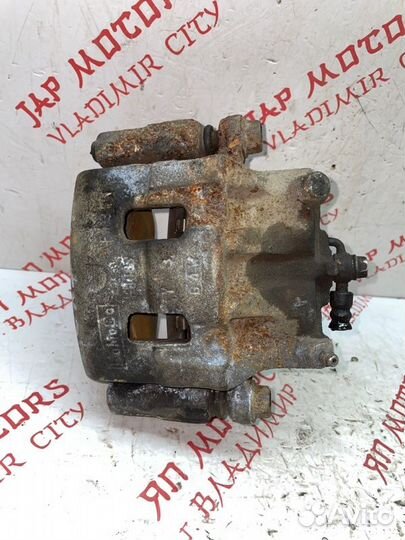 Суппорт тормозной передний правый Mazda Cx7 CBA