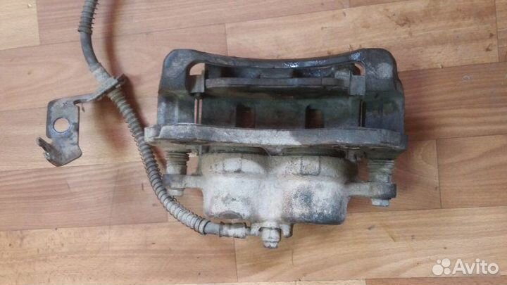 Суппорт тормозной передний правый Ssangyong Actyon