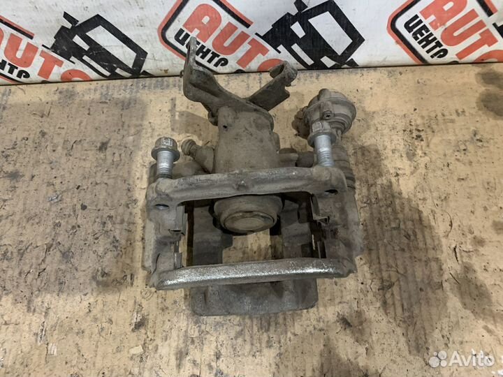 Суппорт задний левый правый Chevrolet Cruze 2013