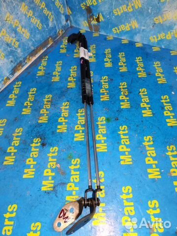 Амортизатор двери багажника Mazda Demio DW3W