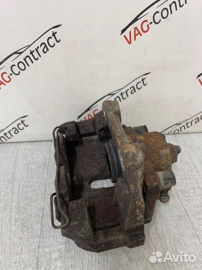 Суппорт тормозной передний правый Skoda Rapid 1.6