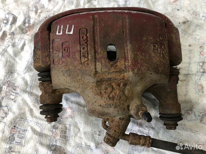 Суппорт тормозной Toyota Corolla AE100 CE100 EE100