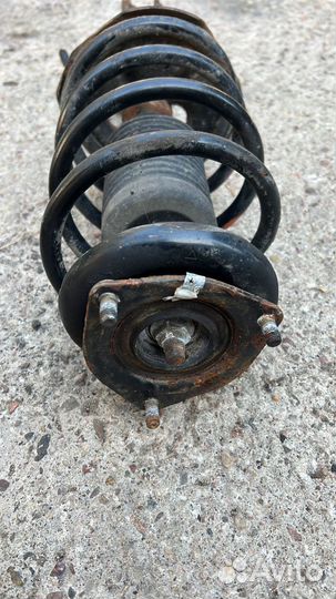 Стойка передняя Nissan Almera N16