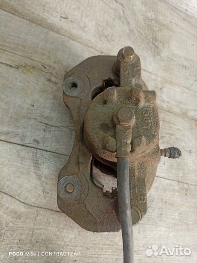 Суппорт тормозной передний правый Mitsubishi