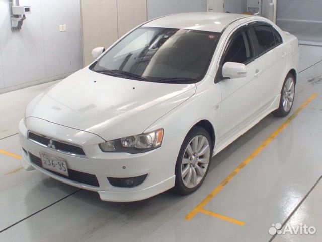 Стекло глухое заднее левое Mitsubishi Lancer 10