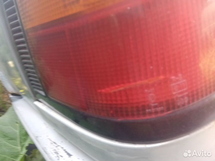 Фонарь задний наружный Honda Concerto