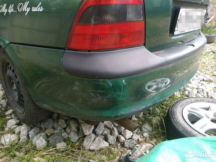 Бампер задний Opel Vectra B