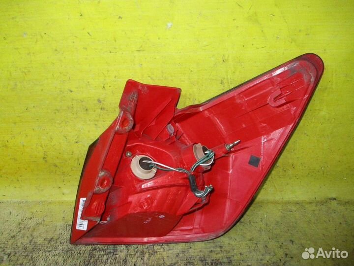 Фонарь левый Toyota Caldina AZT241W