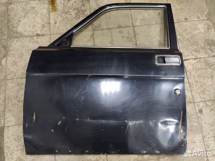Дверь передняя левая Волга