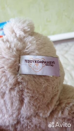 Плюшевый медведь красавчик