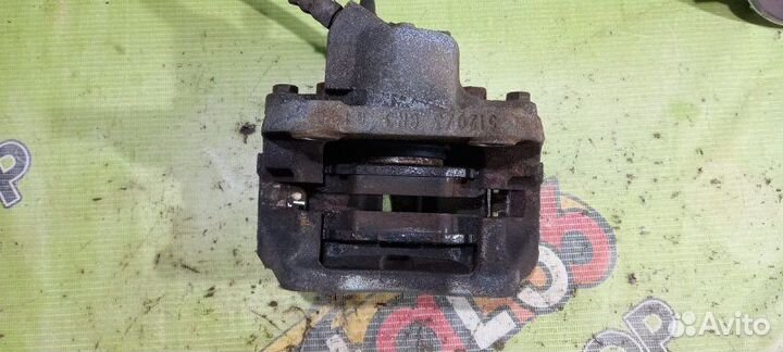 Суппорт тормозной передний правый Renault Logan 1