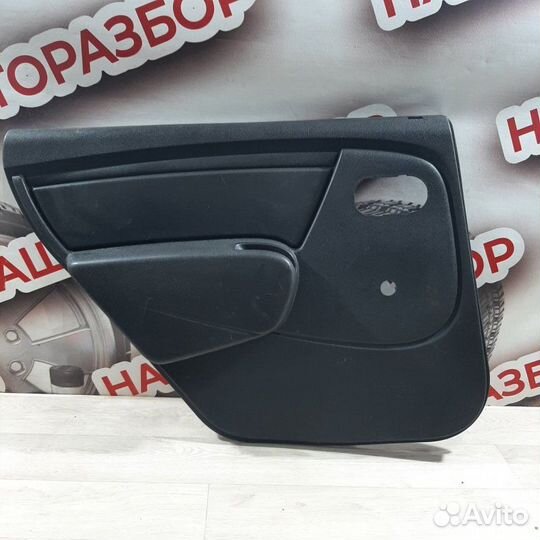 Обшивка боковой двери задняя левая Renault Logan 1