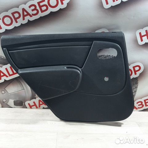 Обшивка боковой двери задняя левая Renault Logan 1