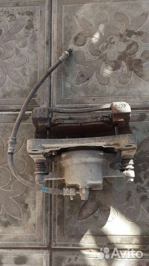 Суппорт передний Mazda CX5 оригинал