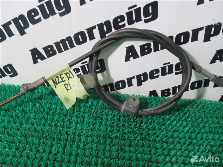 Тросик ручного тормоза левый Toyota Allex NZE121