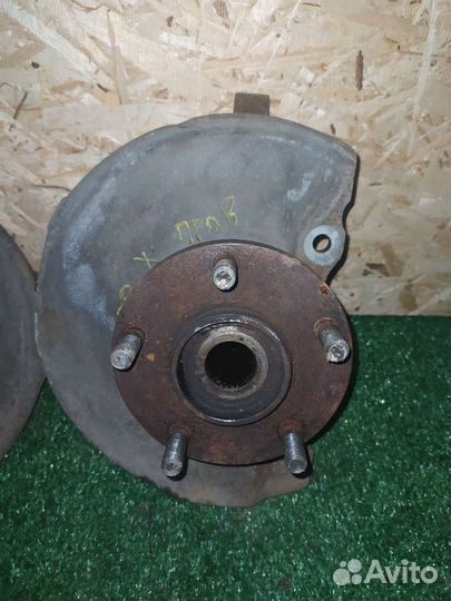 Поворотный кулак передний Mitsubishi Lancer X