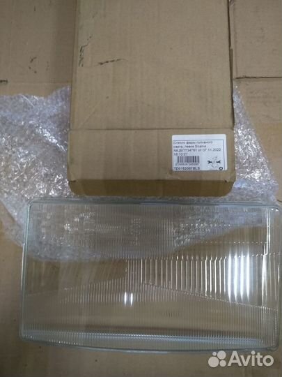 Стекло фары левое головного света Scania TD0152001