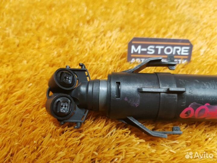 Форсунка омывателя фары передняя правая Volkswagen