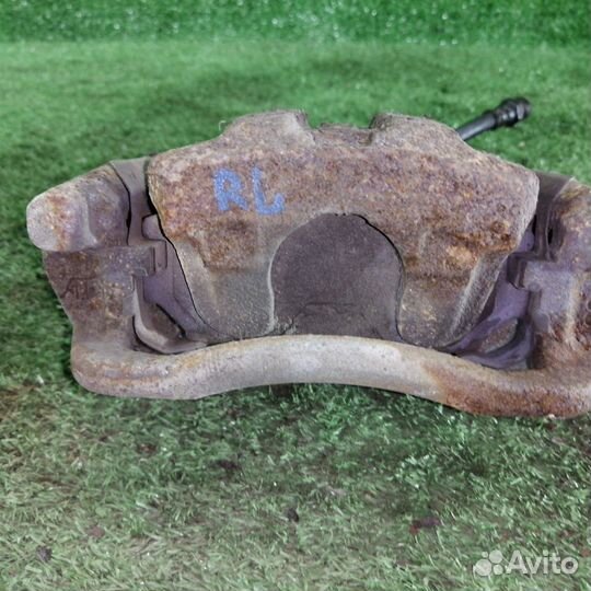 Суппорт тормозной задний левый Mitsubishi Legnum