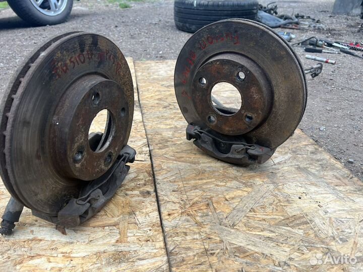 Ford Fusion суппорт тормозной в сборе