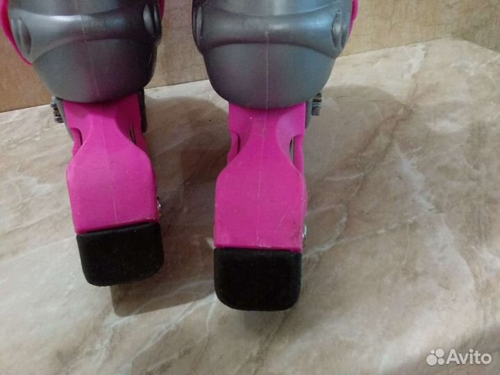 Роликовые коньки