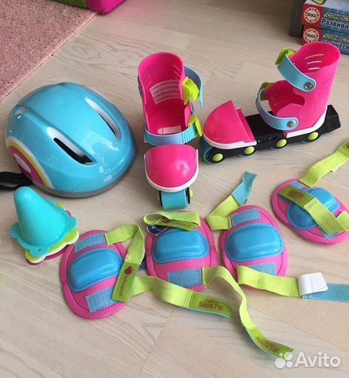 Роликовые коньки