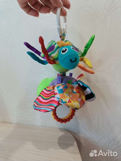 Игрушка на коляску