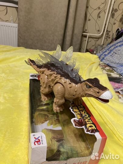 Игрушка динозаврик