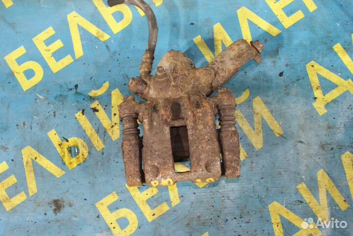 Задний суппорт + скоба Nissan Primera P10