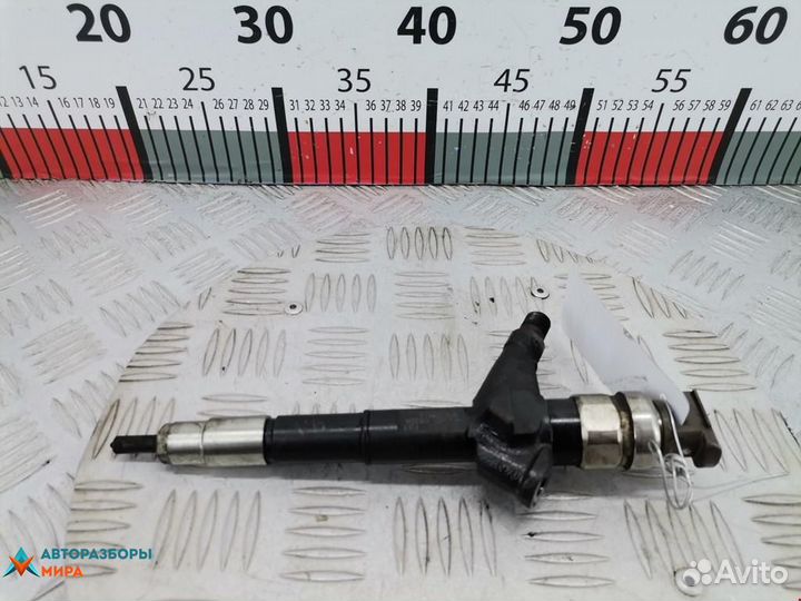 Форсунка Nissan Navara D22 рест. 2005 16600EB30A
