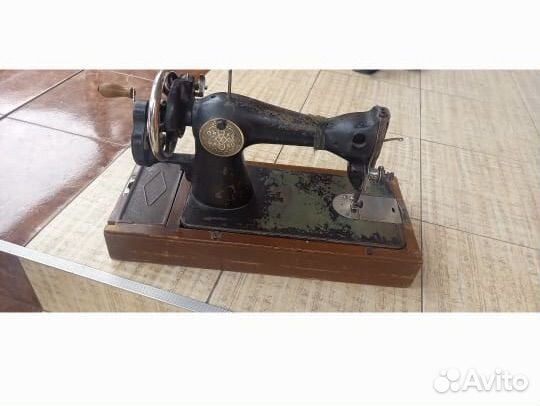 Швейная машина Зингер